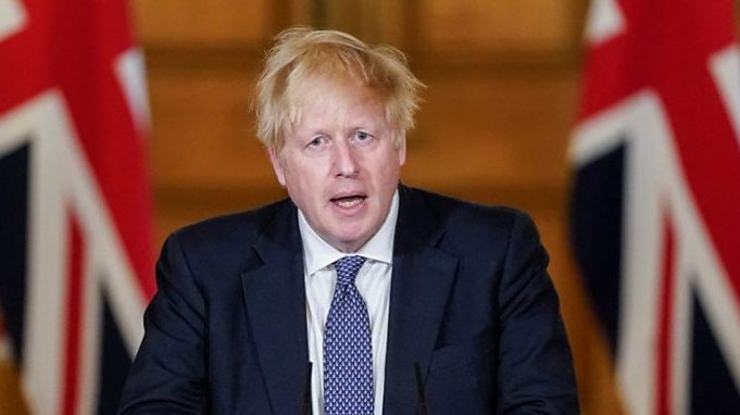 JK jau išgyveno koronaviruso epidemijos piką, sako B. Johnsonas